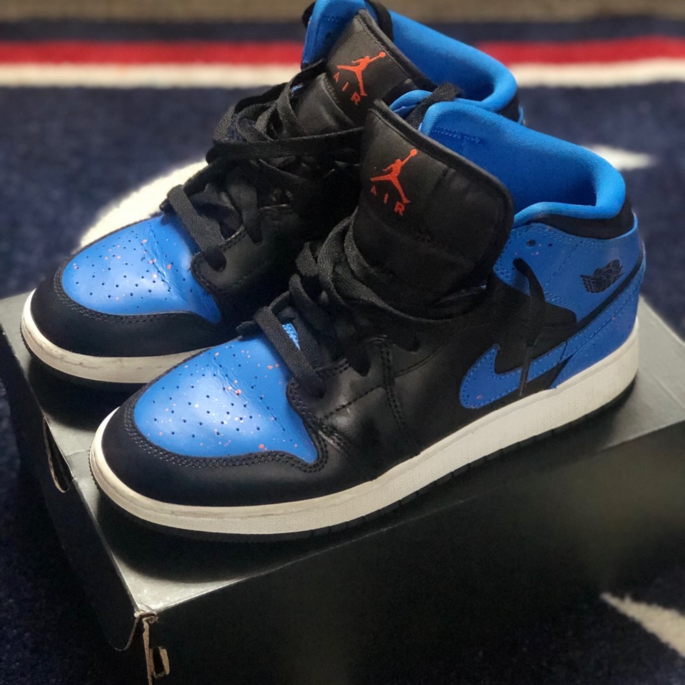 Blue/black/purple/black/pink Jordans Forces.